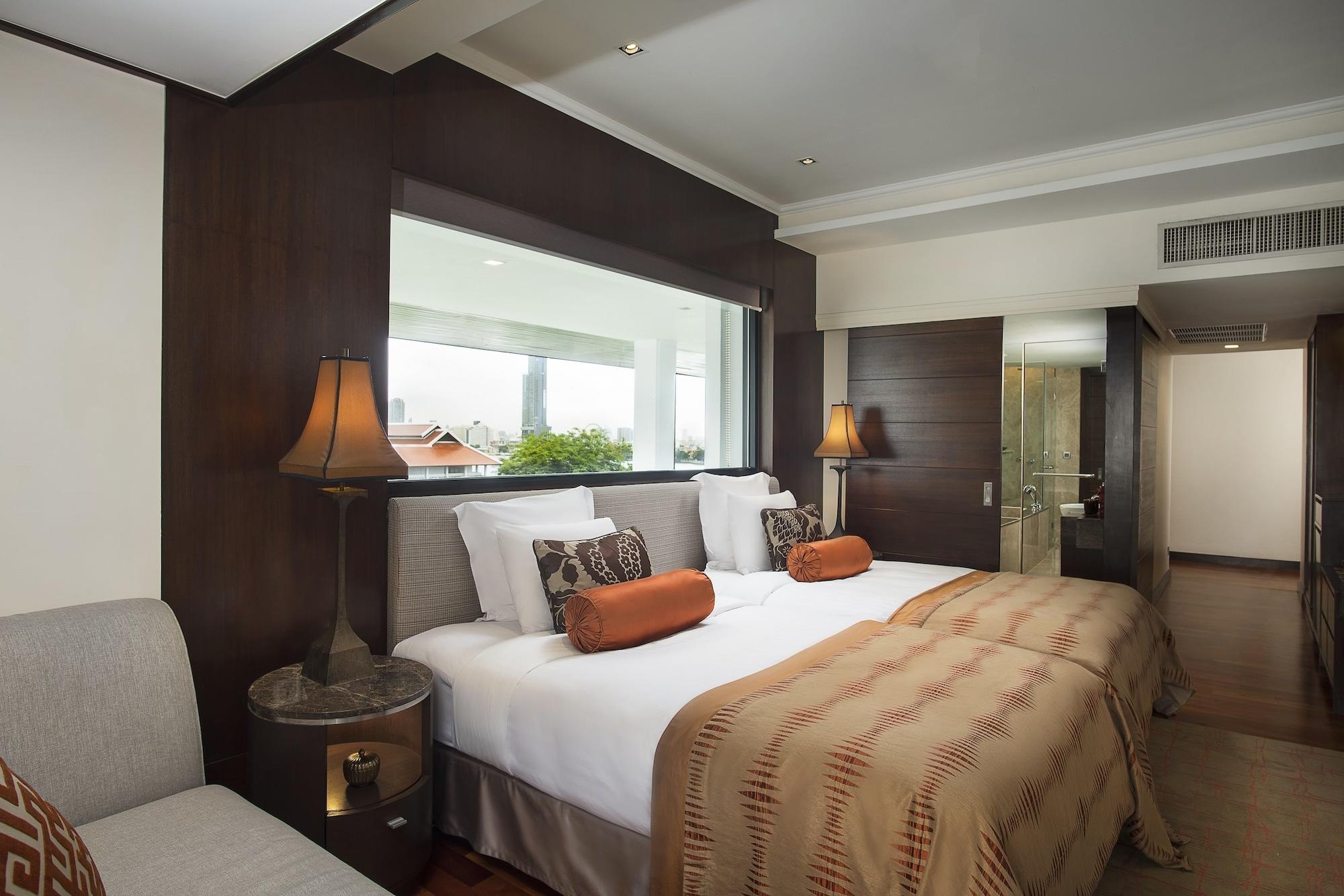 Anantara Riverside Bangkok Resort Exteriér fotografie A bedroom at the Taj Mahal Palace